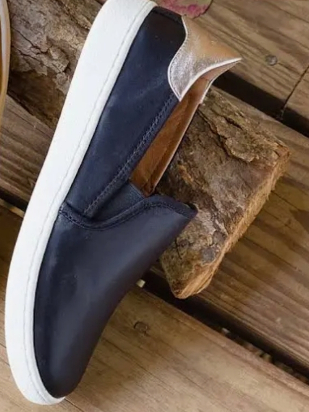 UGG Australia Cas Trainers Black Slip-On Sneakers with Metallic Gold Heel Accent